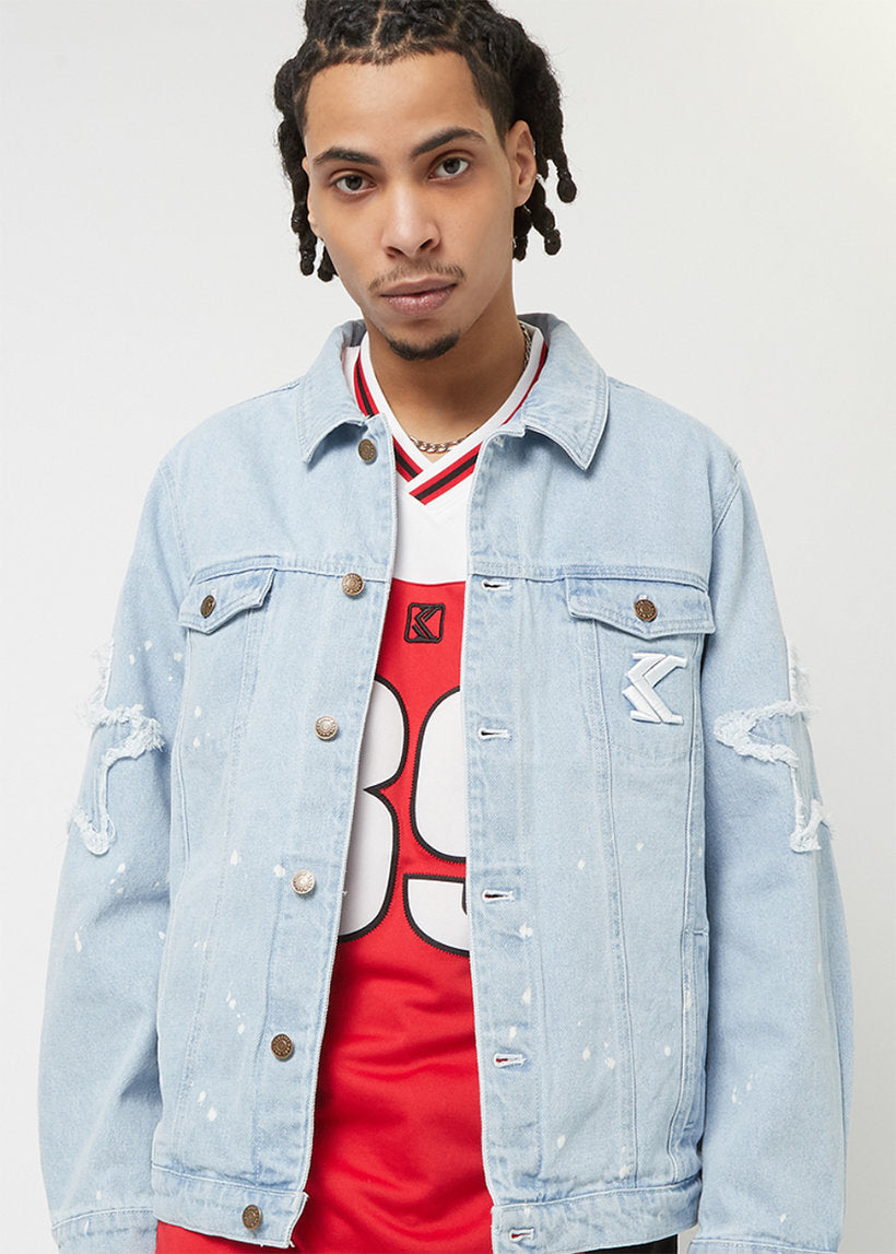 Karl Kani KM241-014 OG Paintsplatter bleached blue denim trucker jacket