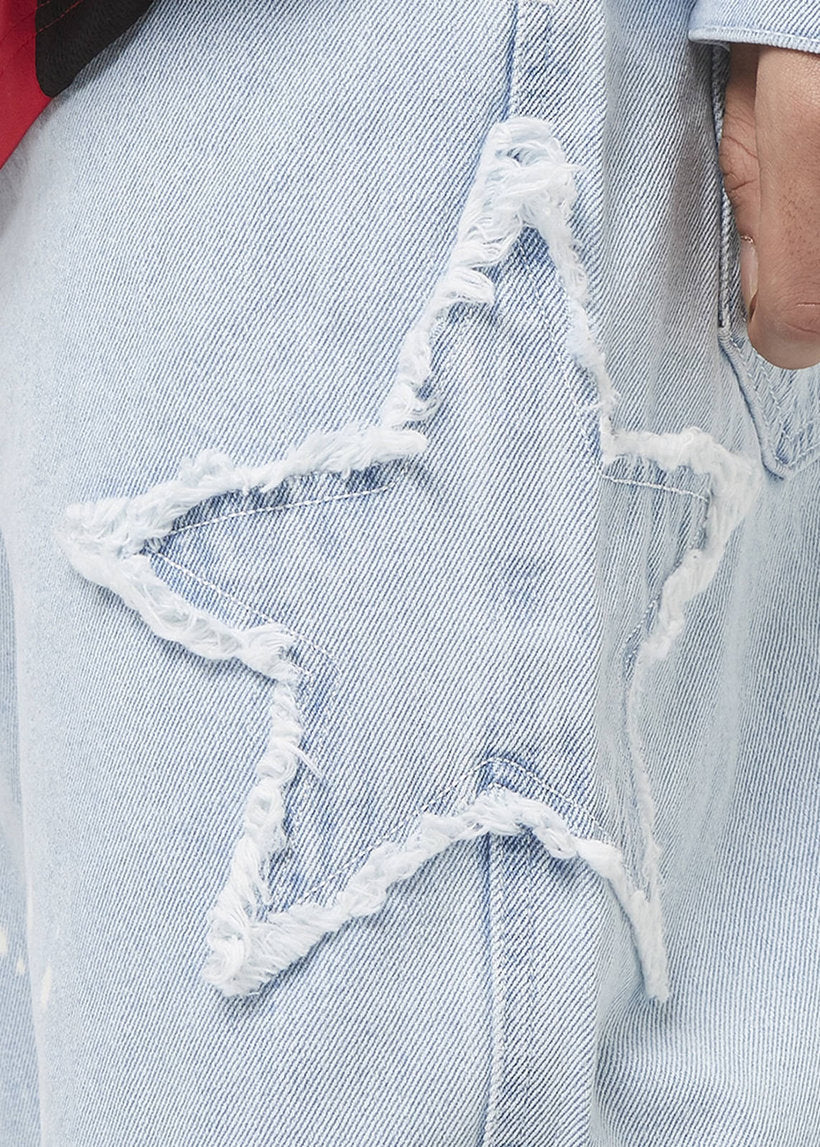 Karl Kani KM241-017 OG Paintsplatter bleached blue baggy five pocket denim pants