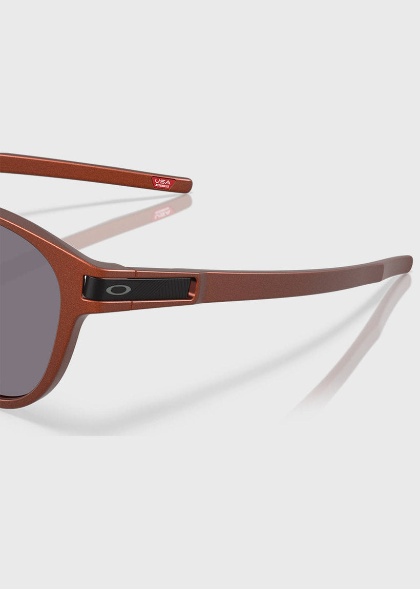 Oakley 92657353 Latch forge fire orange PRIZM polarized grey